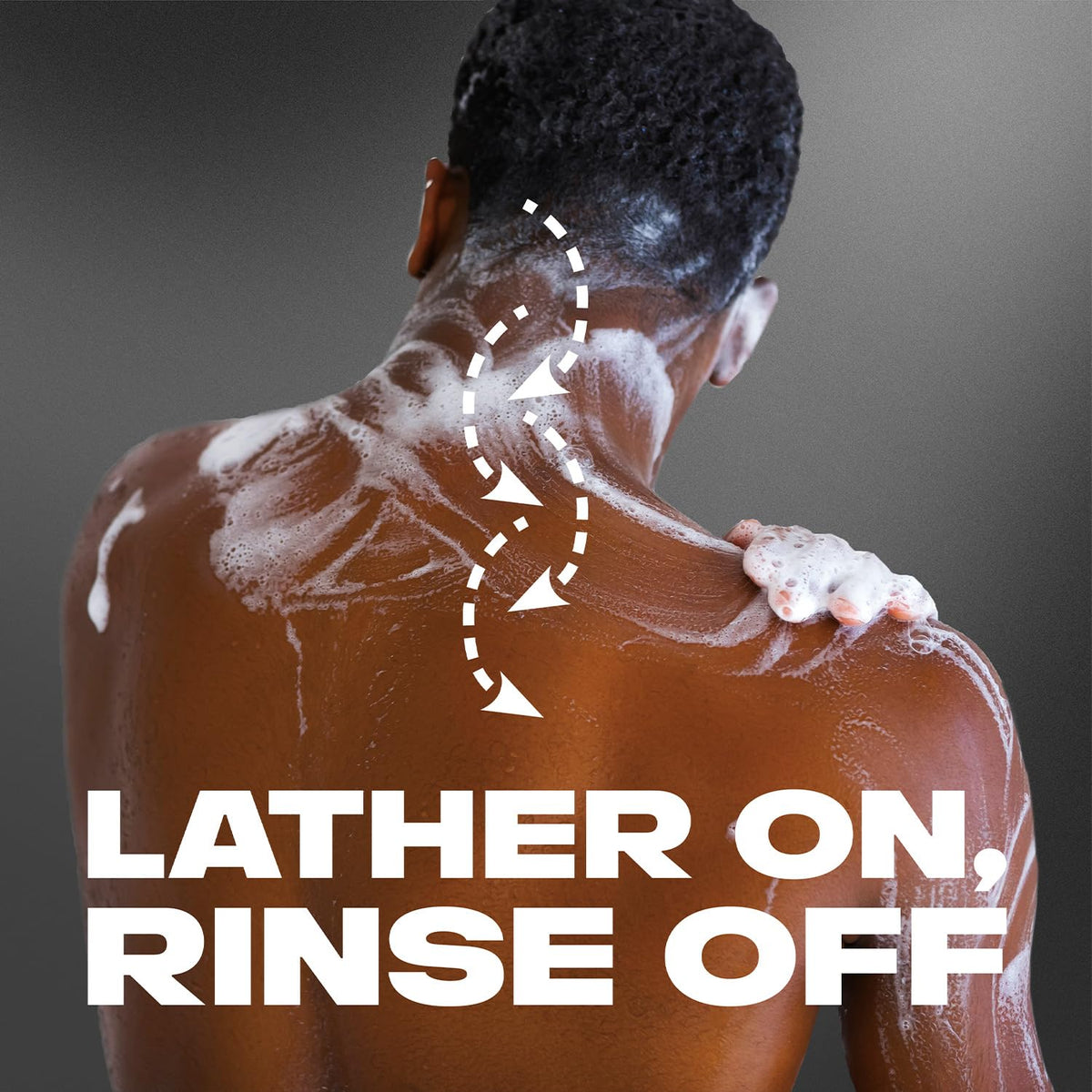 AXE Black in-shower use with man applying wash for fast all-in-one cleansing