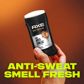 AXE Dark Temptation in hand size comparison showing compact travel-ready benefit