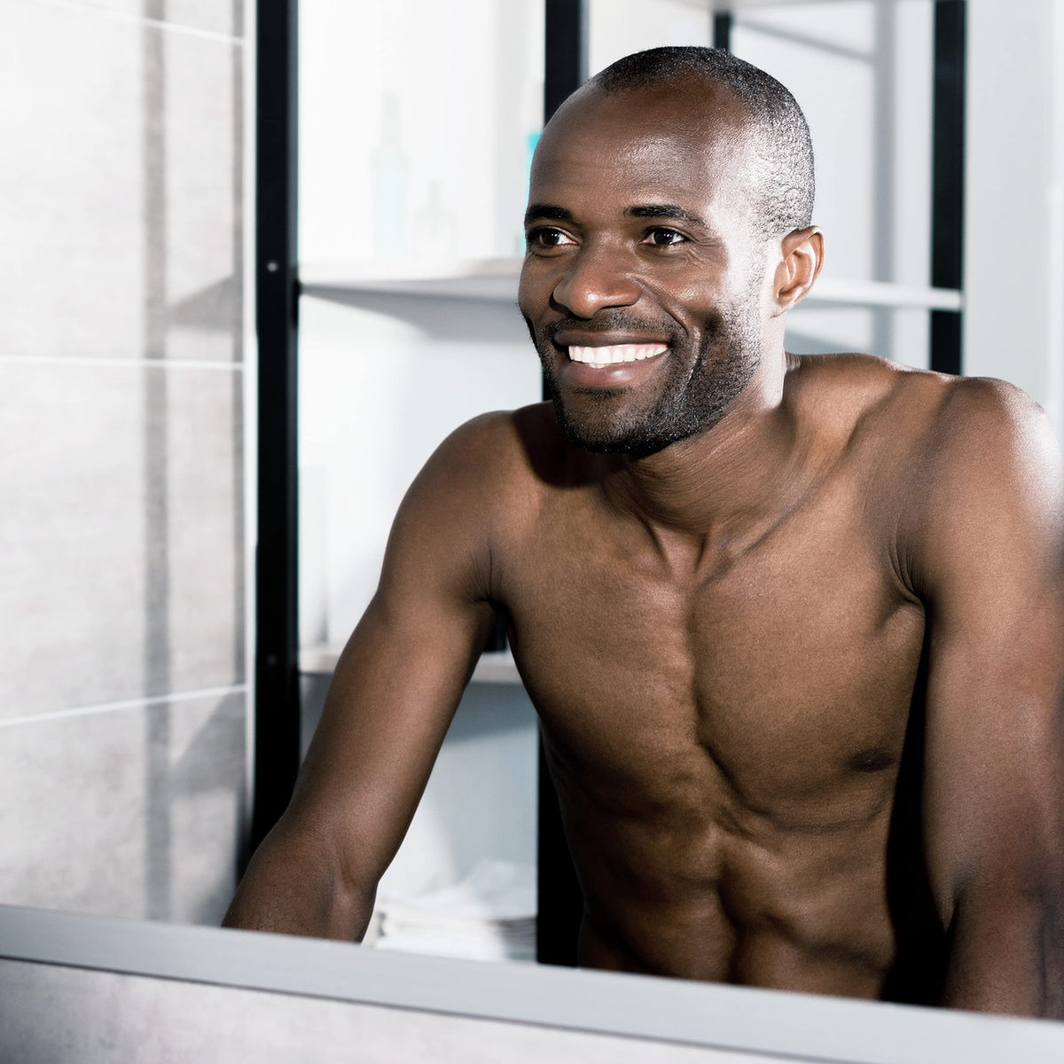 AXE Detailer next to AXE body wash showing compact travel-ready size
