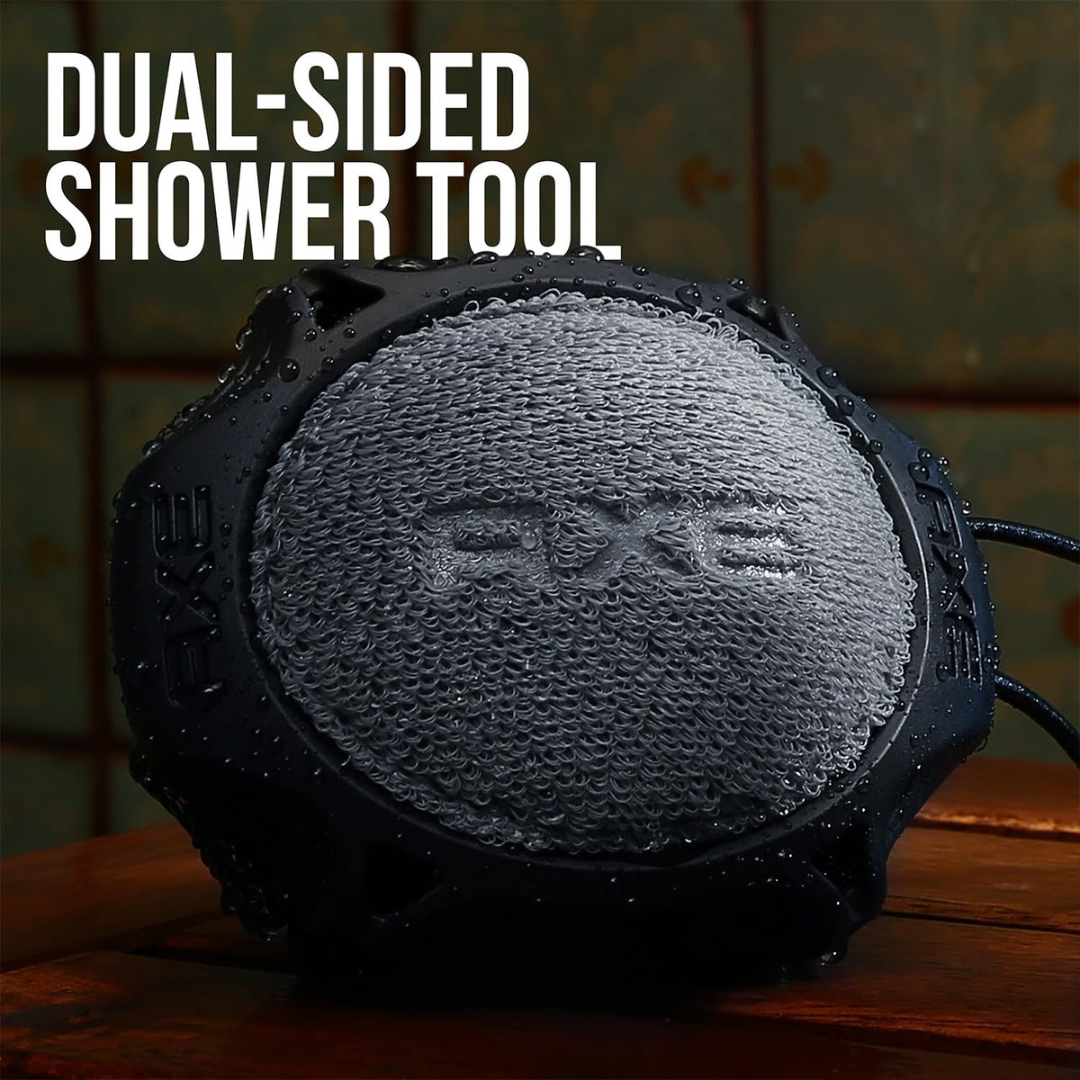 AXE scrubber next to bottle of body wash demonstrating compatibility and product efficiency