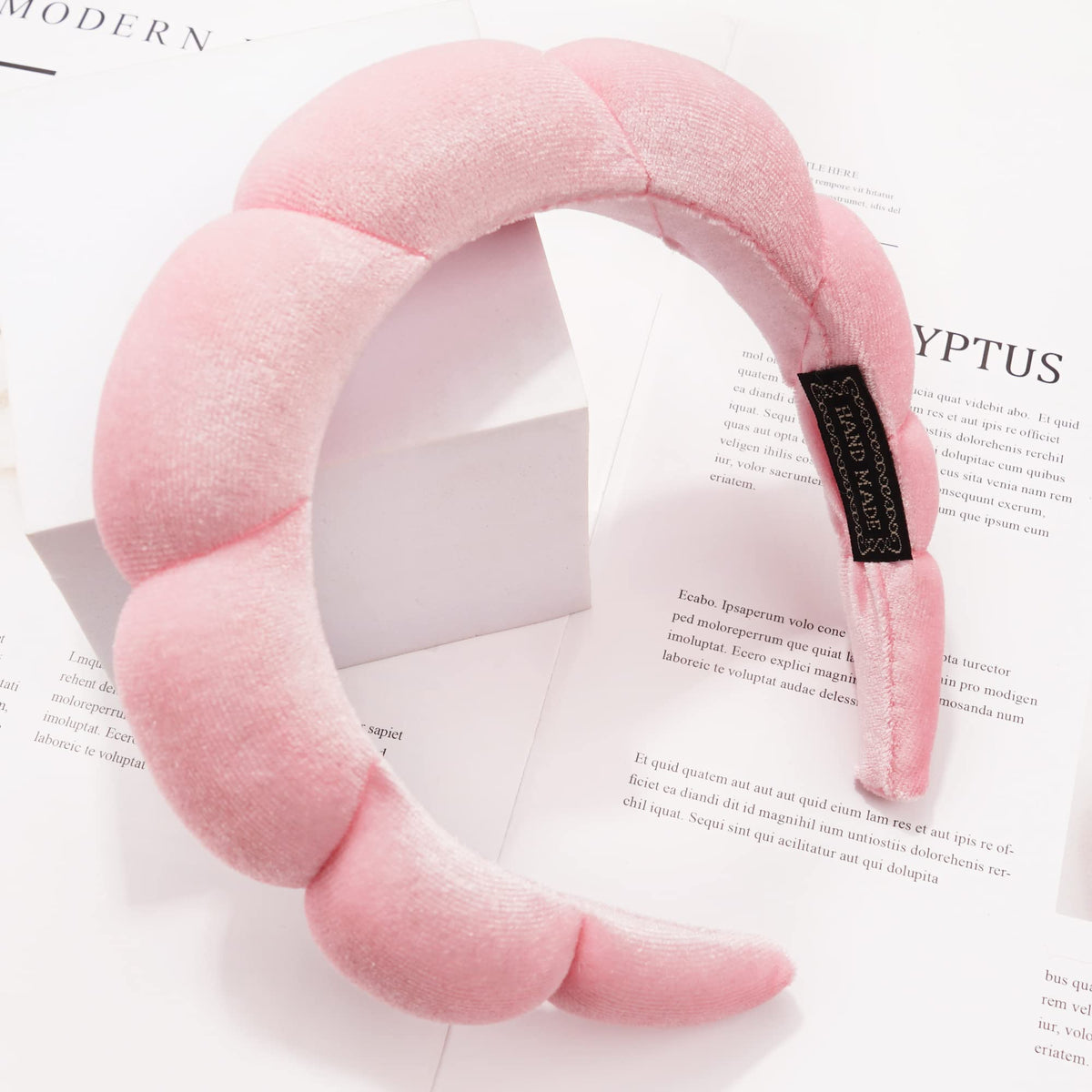 Ayesha headband worn while washing face showing secure non slip benefit