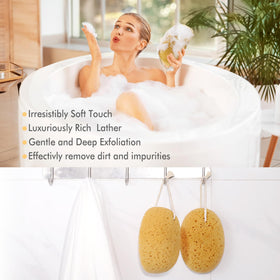 Azymi sponge held in hand illustrating large size for better coverage and grip