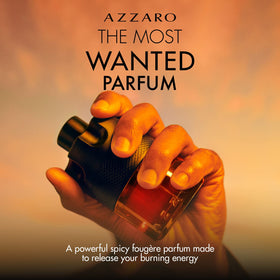 Azzaro angled bottle with cap off highlighting barrel shape and premium feel