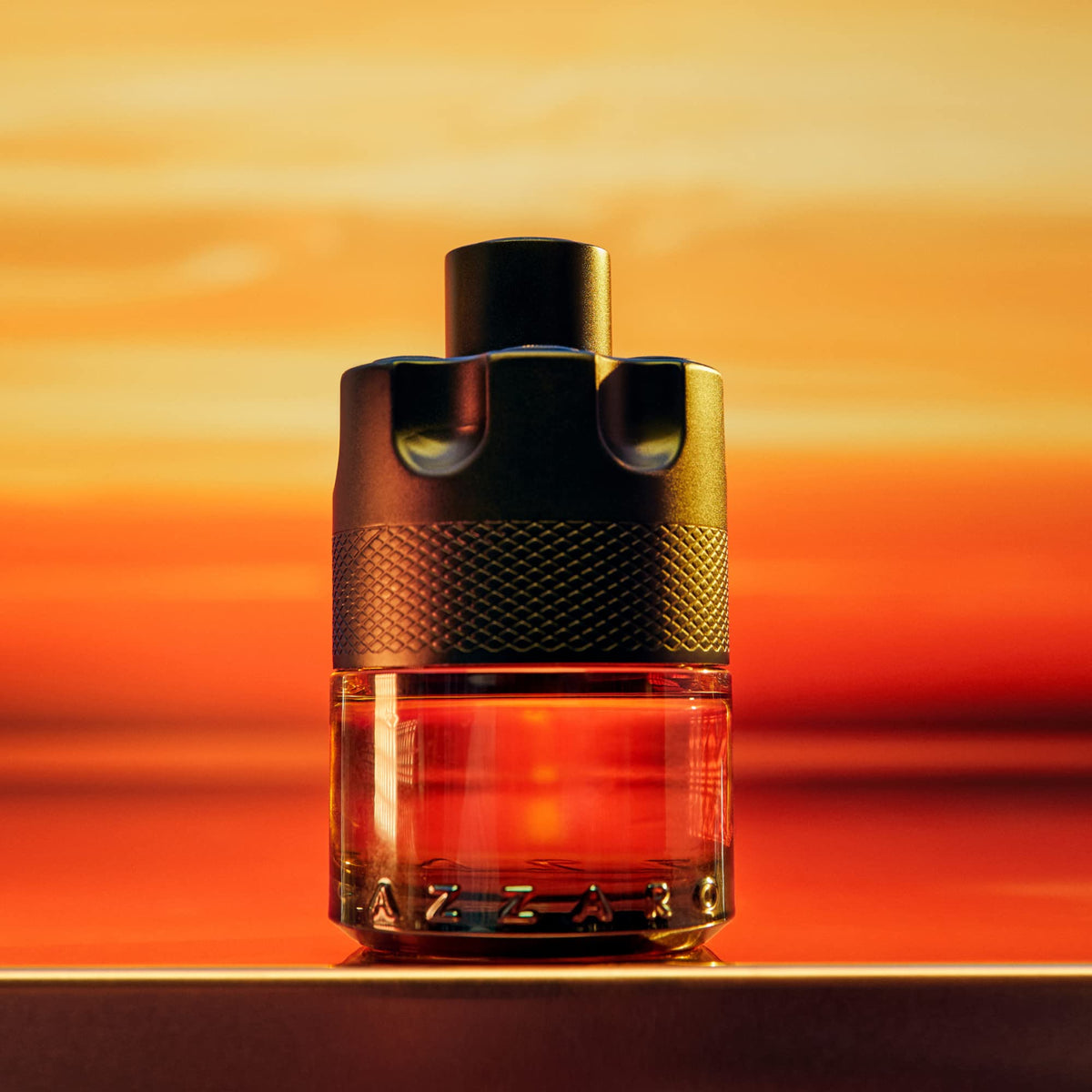 Evening lifestyle shot of Azzaro parfum suggesting seductive date-night appeal