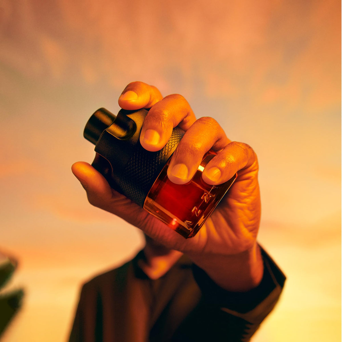 Azzaro sprayed at pulse point demonstrating lasting scent presence