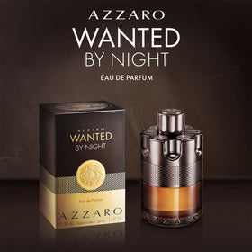 Azzaro Wanted by Night bottle styled in an evening setting suggesting sophisticated wear
