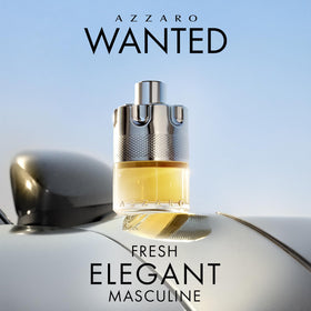 Azzaro wanted spray in action on neck demonstrating easy application and projection
