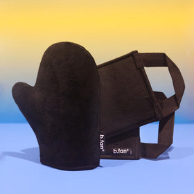 B.TAN mitt next to hand to show scale and ergonomics for comfortable use benefit