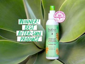 Family outdoors using Babo Botanicals mist to soothe sun-exposed skin safely