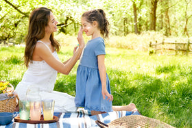 Babo Botanicals family applying sunscreen showing gentle formula for sensitive skin