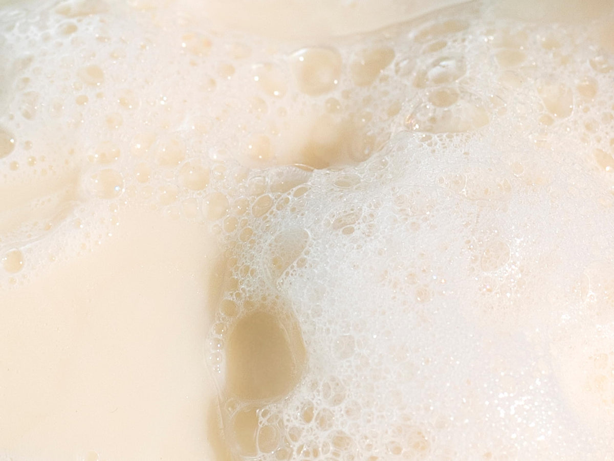 Babo Botanicals close-up of bar texture highlighting smooth, nourishing formula