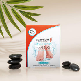 Baby Foot booties worn on feet demonstrating quick 15-minute treatment