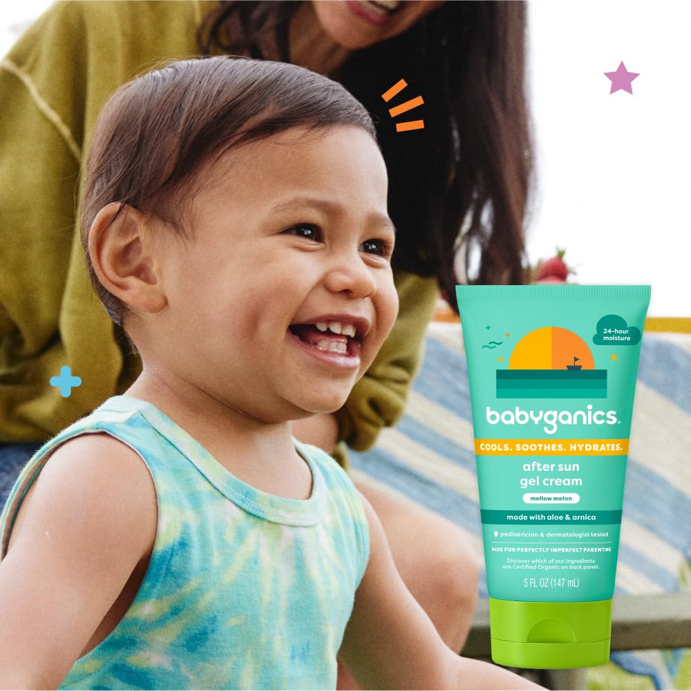 BabyGanics tub on beach towel lifestyle shot showing post-sun care benefit