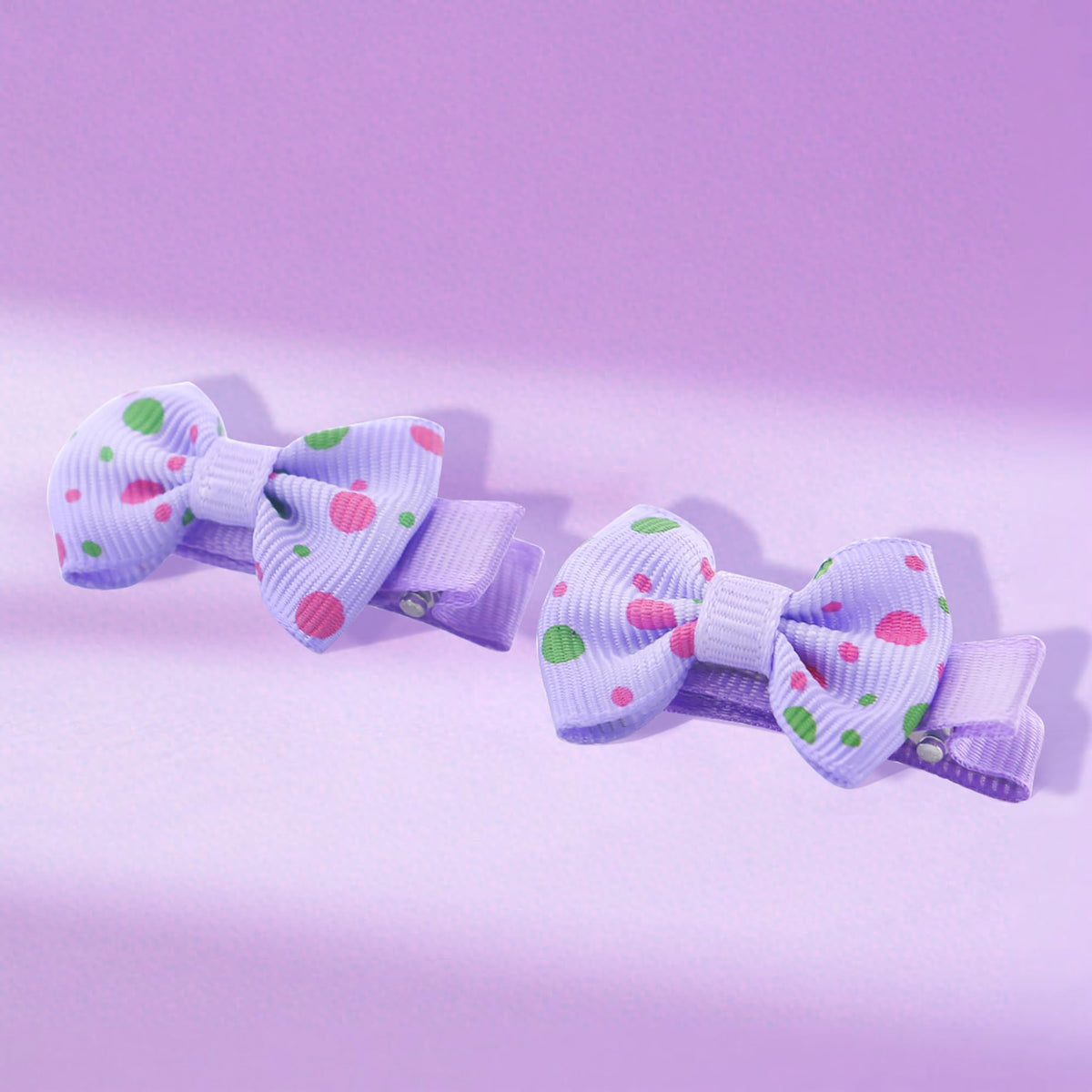 Babymatch bow used on a toddler, secure during play
