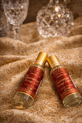 Generic Baccarat Rouge oil size comparison next to credit card to show compactness benefit