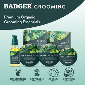 Badger pomade being rubbed between hands, shows smooth spreadability for styling
