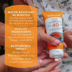 Badger sunscreen at beach showing 80-minute water resistance advantage