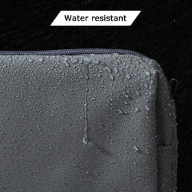 BAGSMART toiletry bag placed on travel luggage demonstrating portability for business trips