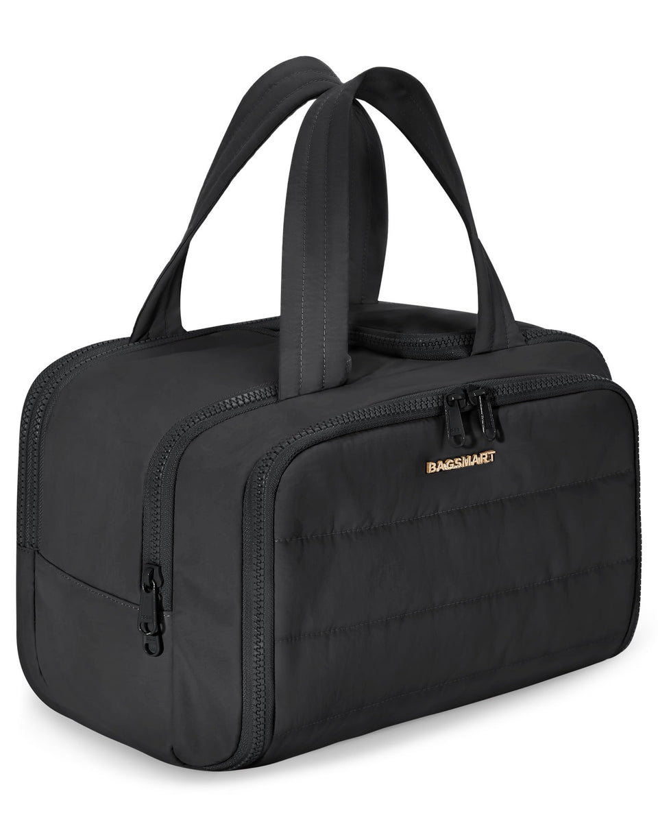 BAGSMART front view of black puffy toiletry bag showing roomy exterior and handle benefit: easy carry