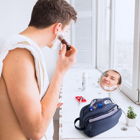 BAGSMART toiletry bag in travel scene on suitcase, streamlined packing for trips
