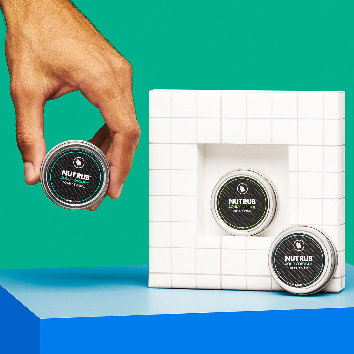 Ballsy being applied to skin from fingertips demonstrating discreet all-over freshness