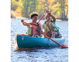 Banana Boat being applied by runner showing sweat-resistant performance benefit