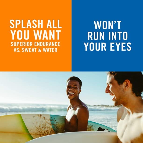Athlete applying Banana Boat at the beach for sweat-resistant protection