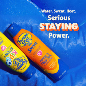 Banana Boat bottle with water droplets demonstrating resistance