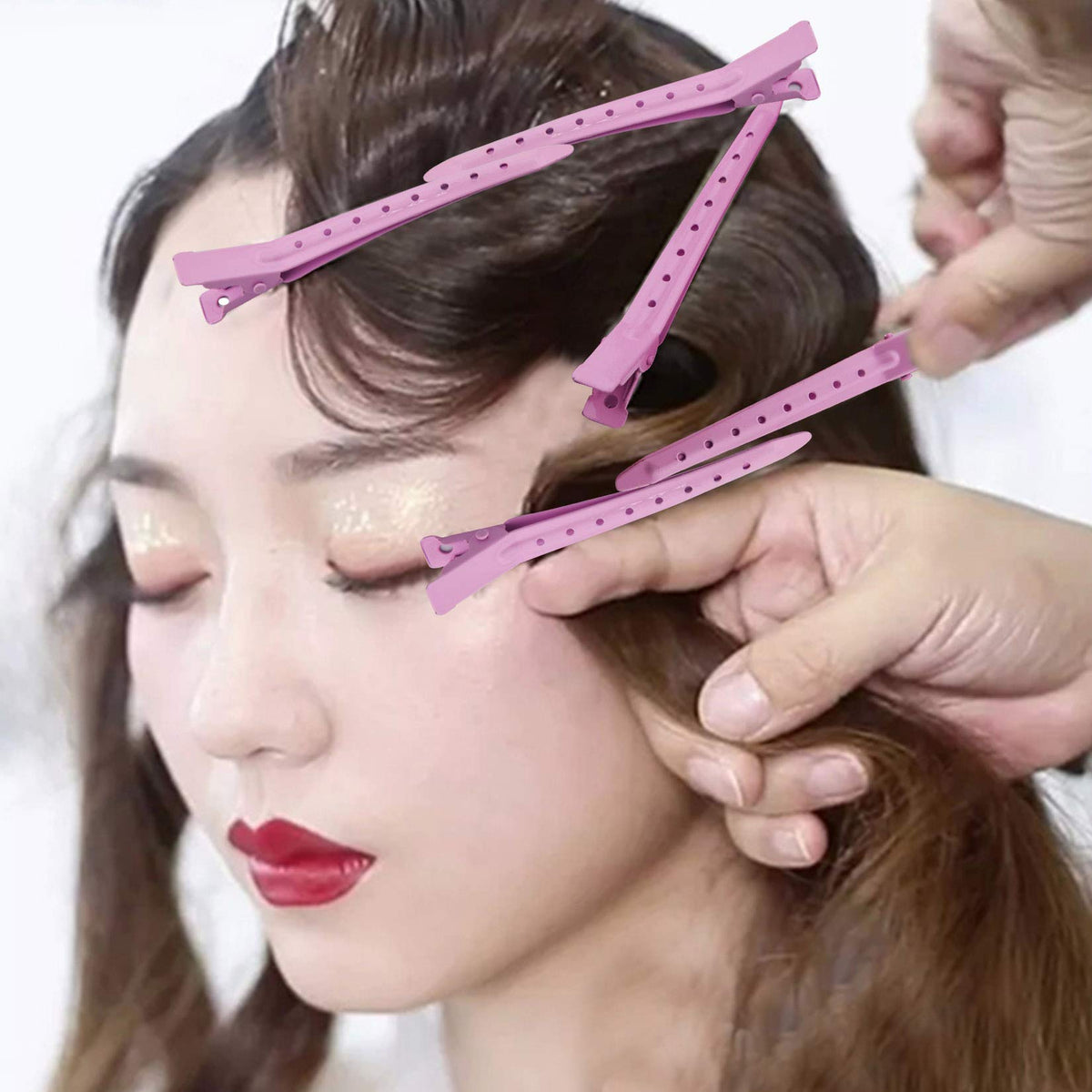 Bantoye stylist using clips in salon illustrating professional-grade organization