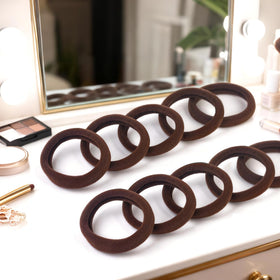 BAOLI large hair tie next to coin showing 2 inch diameter for big ponytails