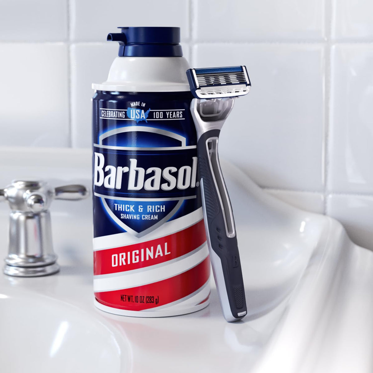Barbasol razor being rinsed in shower illustrating easy clean-rinse blades