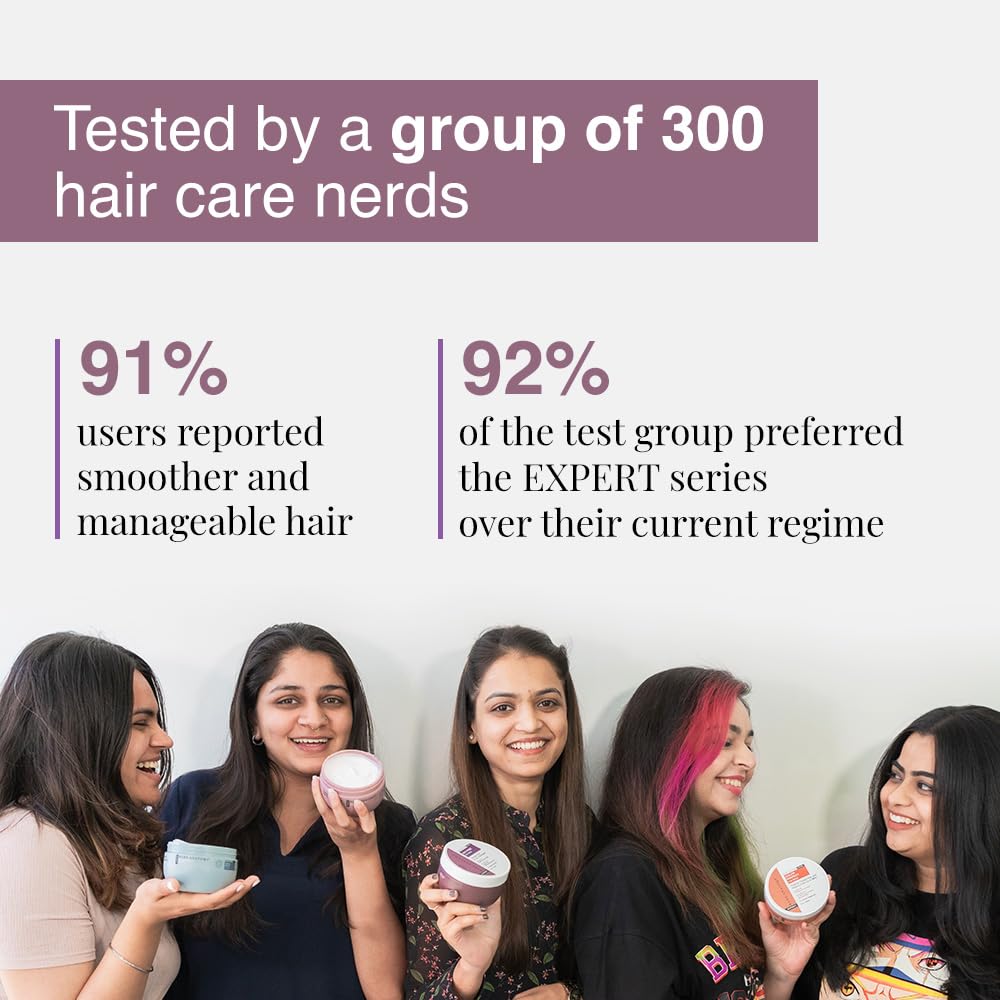 Applying Bare Anatomy mask to damp hair mid-lengths demonstrating smoothing and detangling action