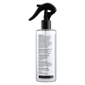 Bare Anatomy 200ml bottle beside hand for size and scale clarity