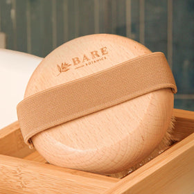 Bare Botanics palm-held scale demonstrating compact ergonomic design