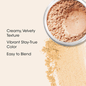 bareMinerals application with brush demonstrating buildable pigment payoff