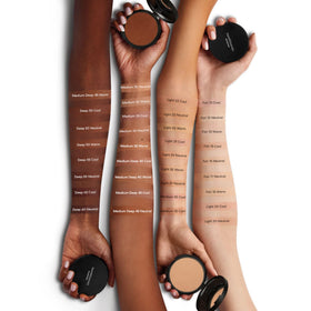 bareMinerals compact held in hand to show scale and travel-friendly size benefit: easy portability