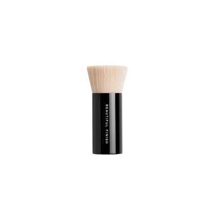 bareMinerals brush front view showing rounded head and large skirt for fast coverage