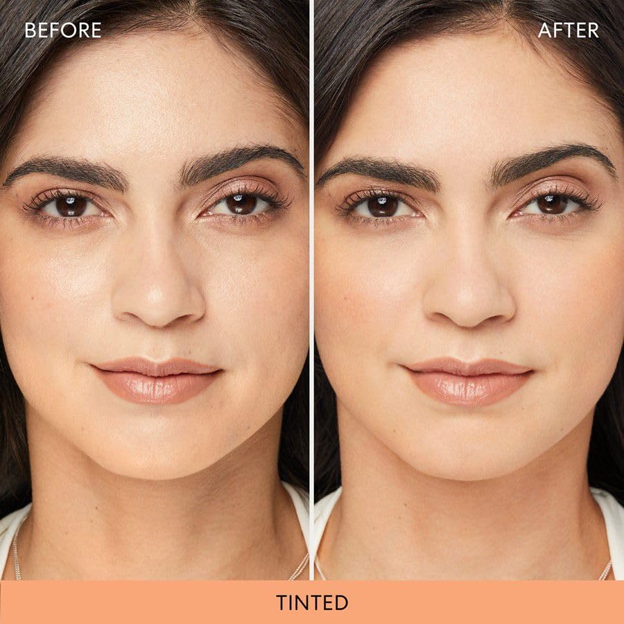 bareMinerals powder applied with brush on hand to show blendability benefit