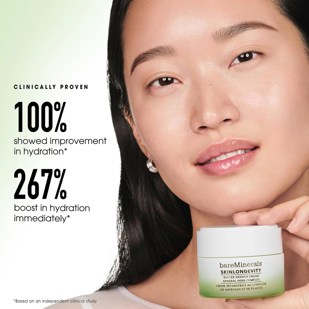 bareMinerals cream on fingers demonstrating spreadability and immediate absorbency benefit