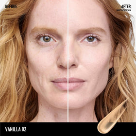 bareMinerals dispensing product from tube to fingertip for quick application