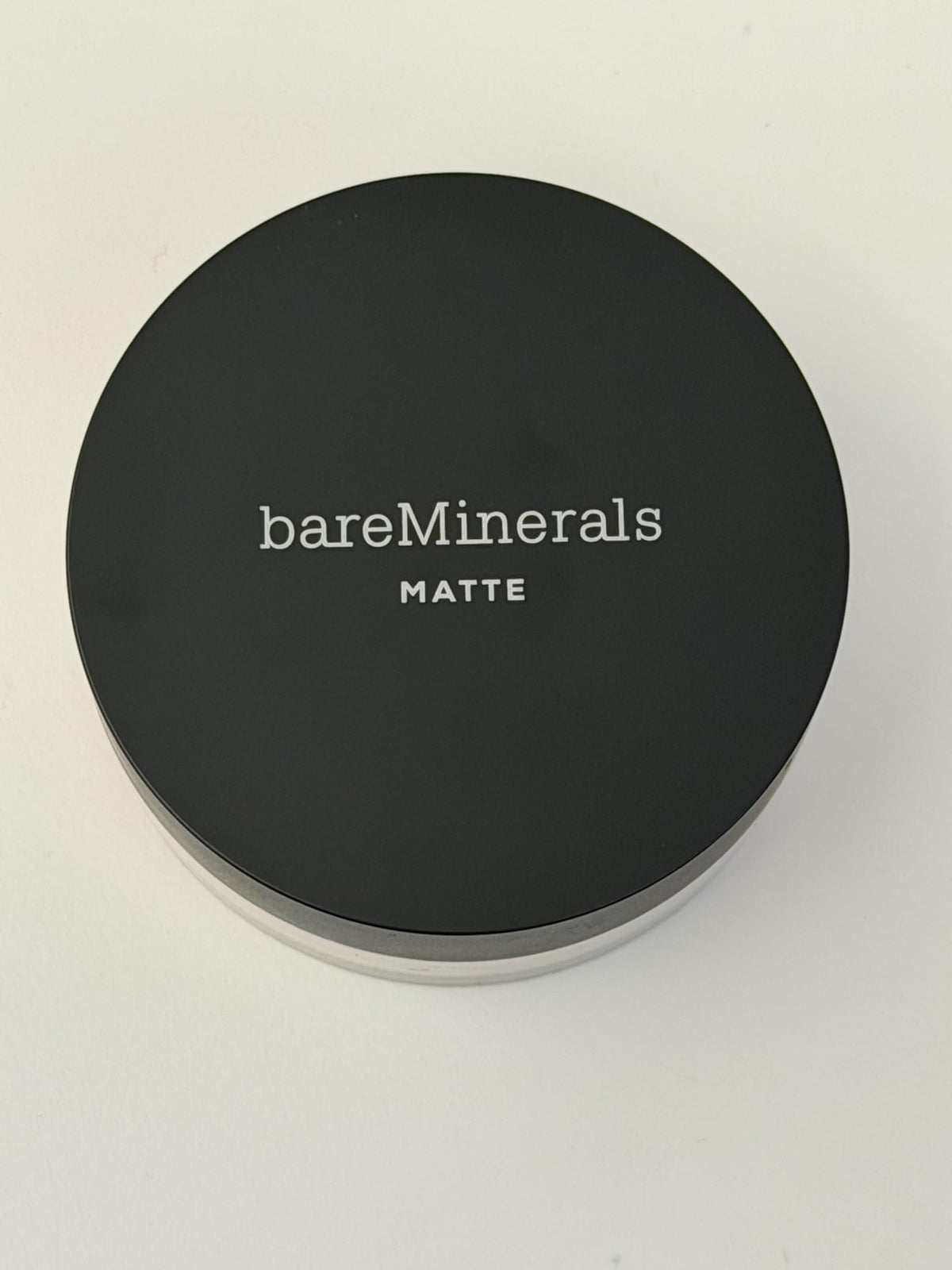 bareMinerals before and after face comparison showing reduced shine