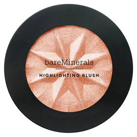 bareMinerals peach glow swatch on skin showing subtle luminous finish