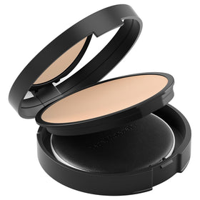 bareMinerals powder swatch on skin demonstrating sheer coverage and matte benefit