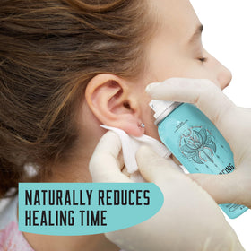 BASE LABORATORIES saline spray used on a nose piercing to gently cleanse