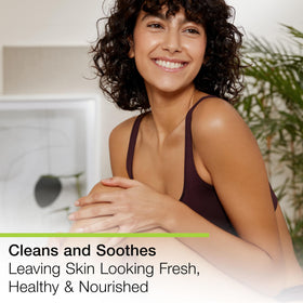 Basis lather on hand demonstrating soft foam and effective gentle cleansing without drying