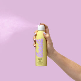 Bask sunscreen being applied on a beach, reef‑friendly protection for outdoor activities