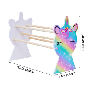 Basumee next to ruler for scale showing compact dimensions and suitability for shelves