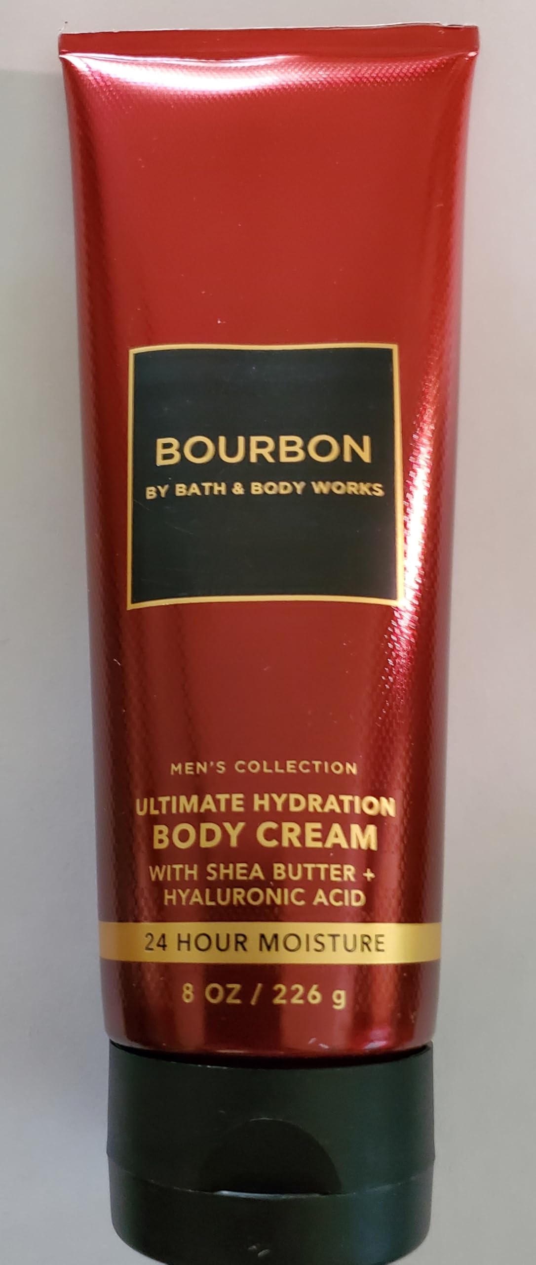 Bath & Body Works Bourbon cream in hand demonstrating quick absorption and moisturization