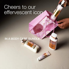 Bath & Body Works close-up of fragrance mist bottle label highlighting scent and easy spray application benefit