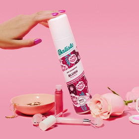 Batiste in a travel bag on a vanity illustrating portable refresh on the go